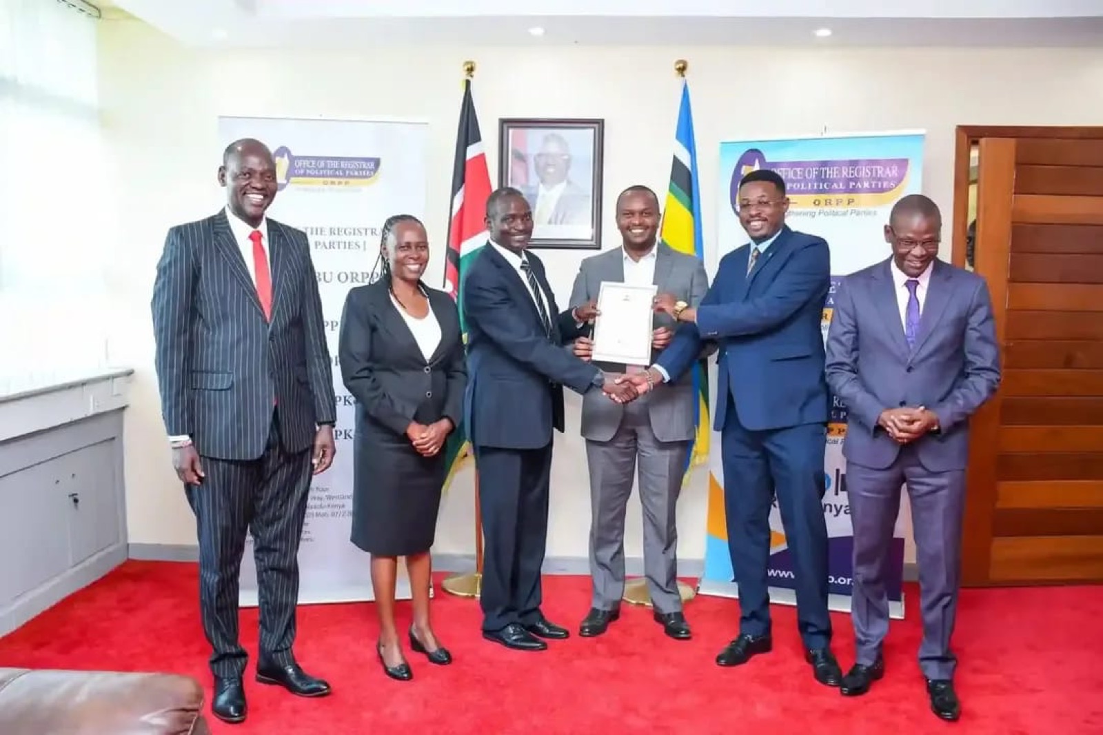 A certificate handover at the Office of the Registrar of Political Parties