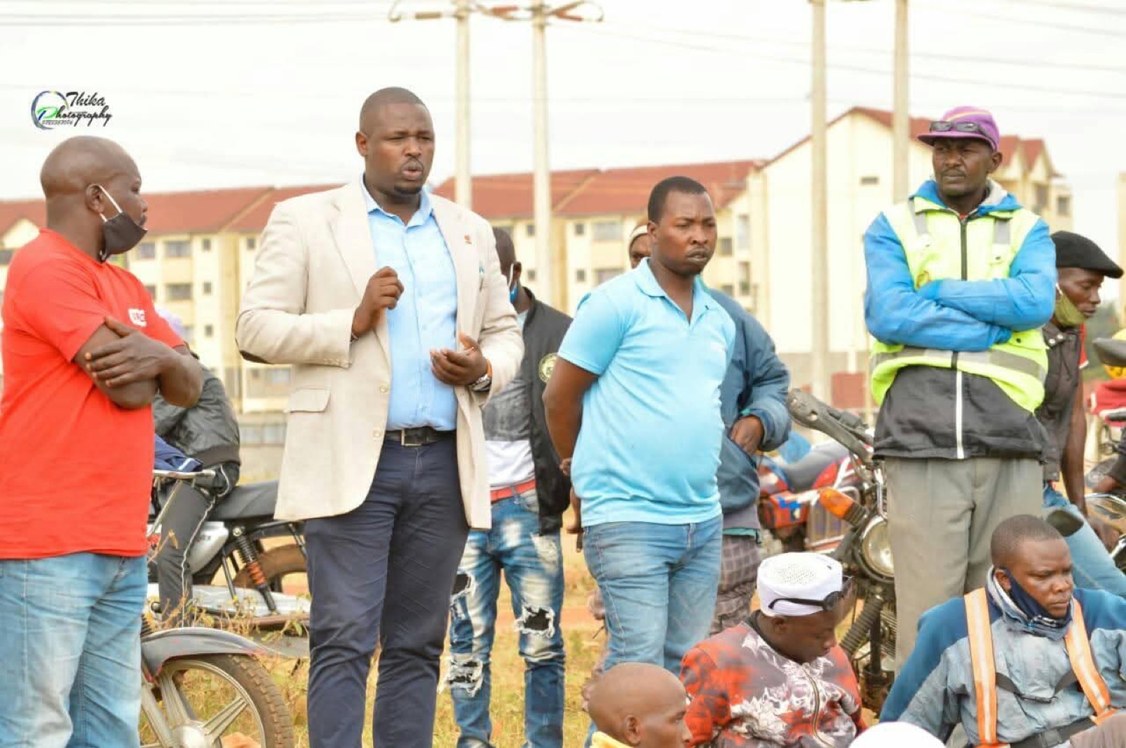 Kahara in discussion with riders and residents