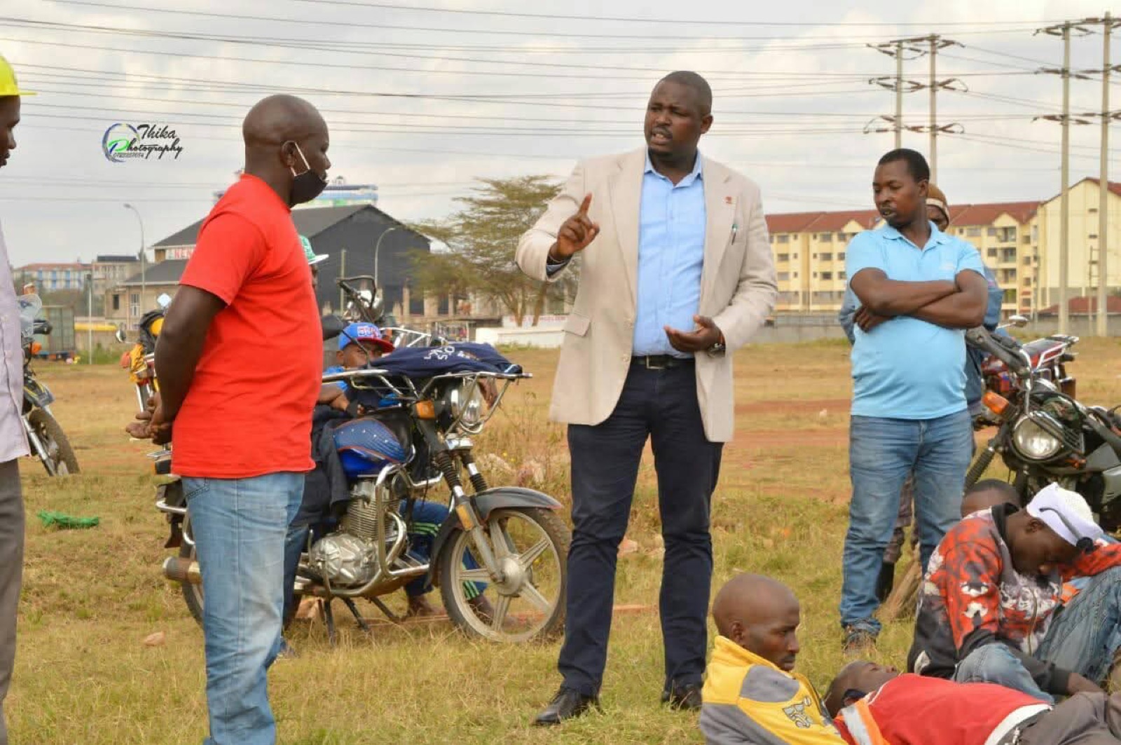 Kahara making a point during a dialogue with boda boda riders